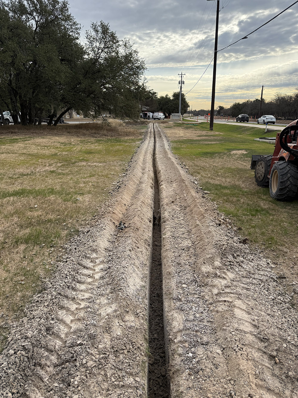 Trenching for underground utility line installation